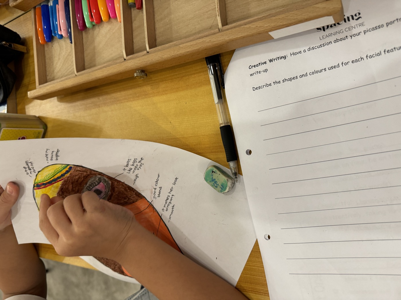 Preschool student working on an early literacy activity