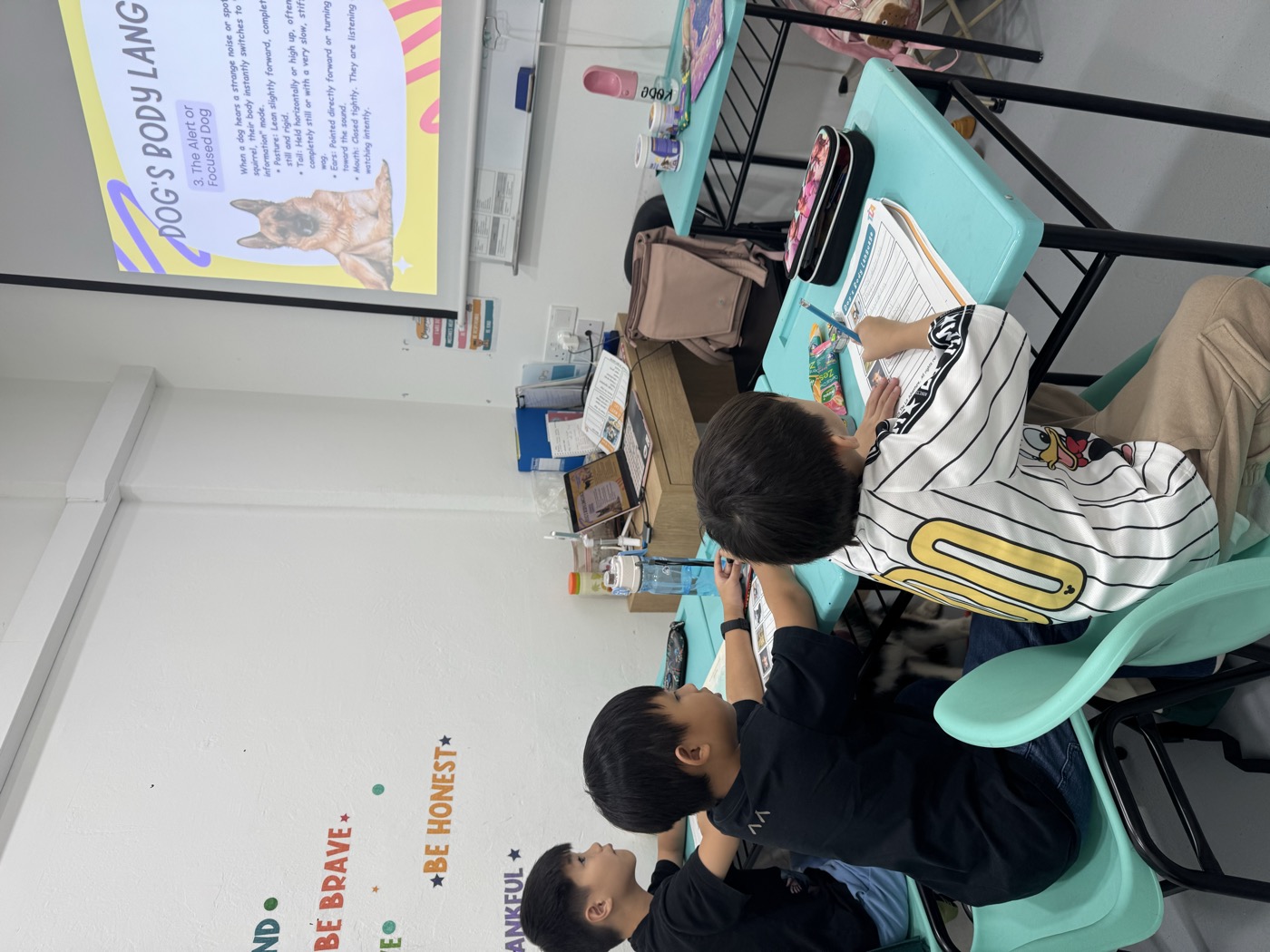 Students learning about dog body language during the Adventure with Kobe workshop