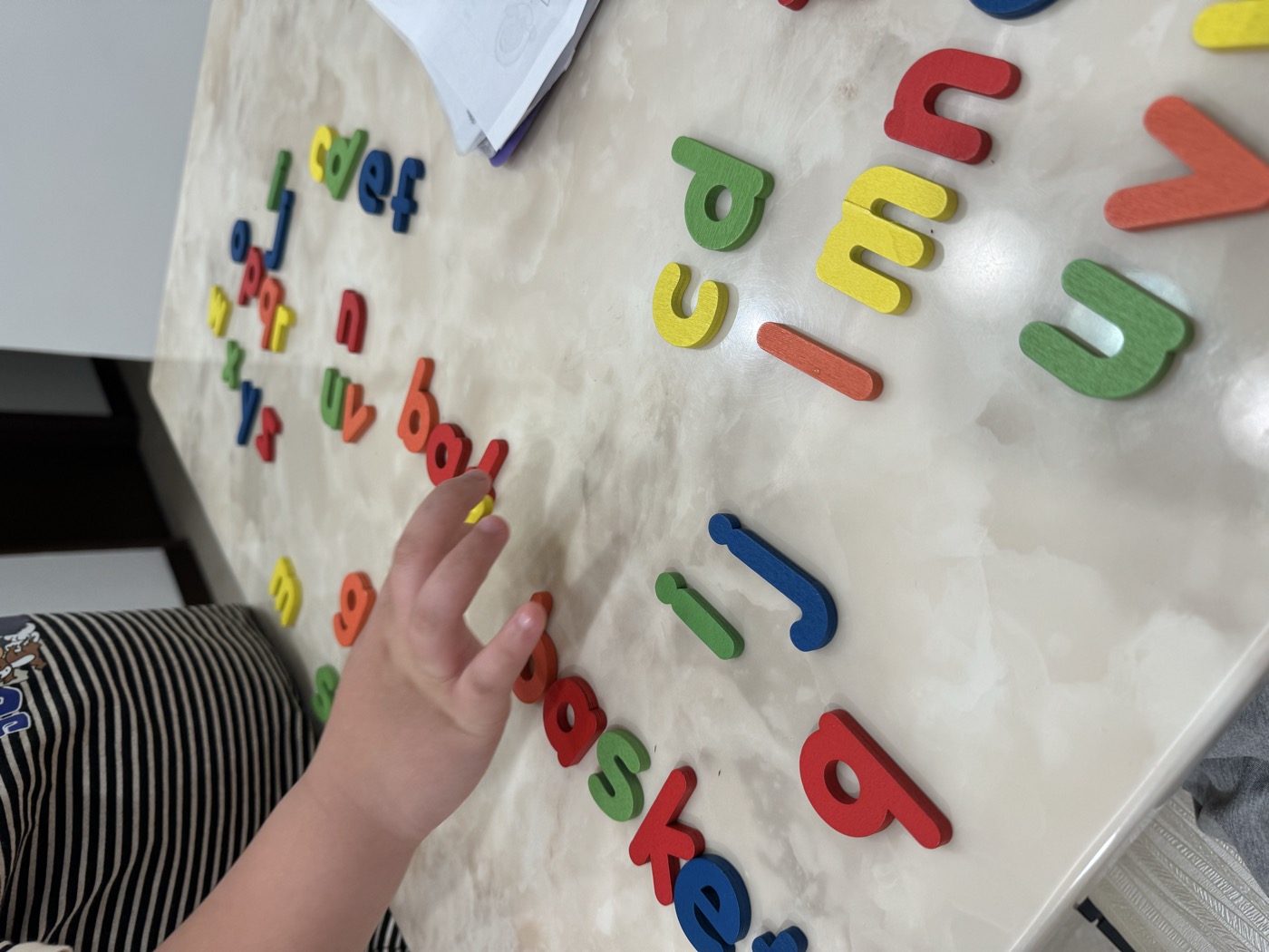 Student working through an alphabet letter activity